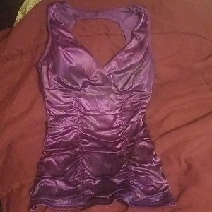 A sleeveless purple tank top